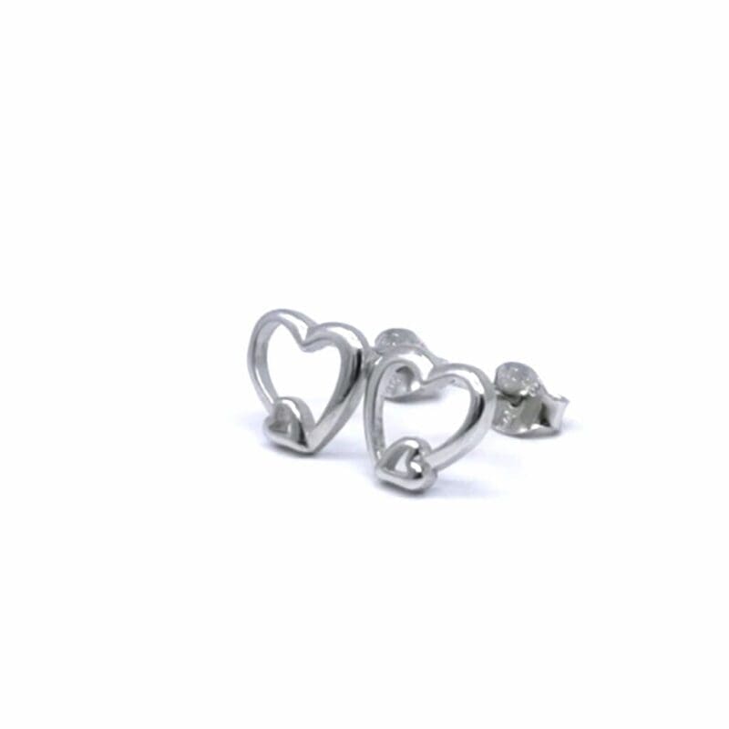 Double-heart contour stud earrings in hallmarked, rhodium-plated 925 sterling silver – angled view – DRESCHER Jewellery®