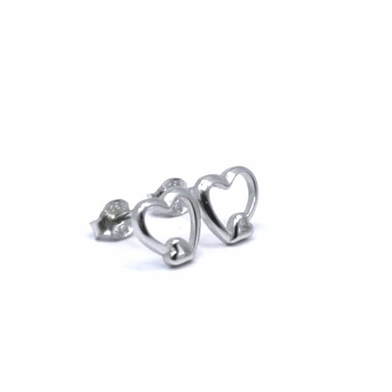 Double-heart contour stud earrings in hallmarked, rhodium-plated 925 sterling silver – side view – DRESCHER Jewellery®