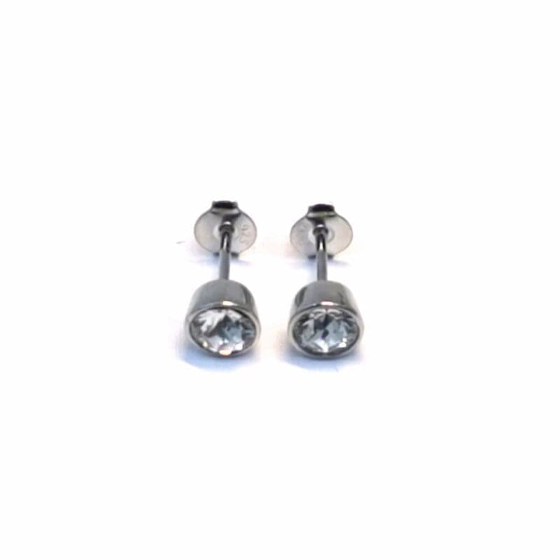 Round white stone drop stud earrings in hallmarked, rhodium-plated 925 sterling silver – front view – DRESCHER Jewellery®