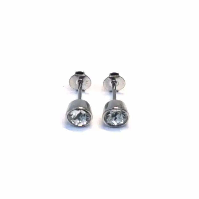 Round white stone drop stud earrings in hallmarked, rhodium-plated 925 sterling silver – front view – DRESCHER Jewellery®