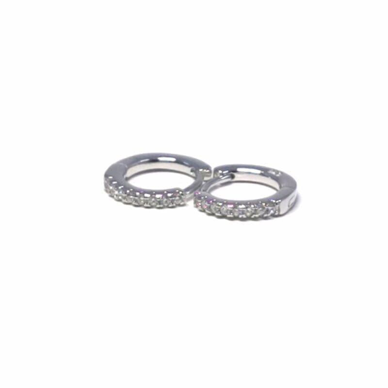 Single-row white stone small hoop earrings in hallmarked, rhodium-plated 925 sterling silver – angled view – DRESCHER Jewellery®