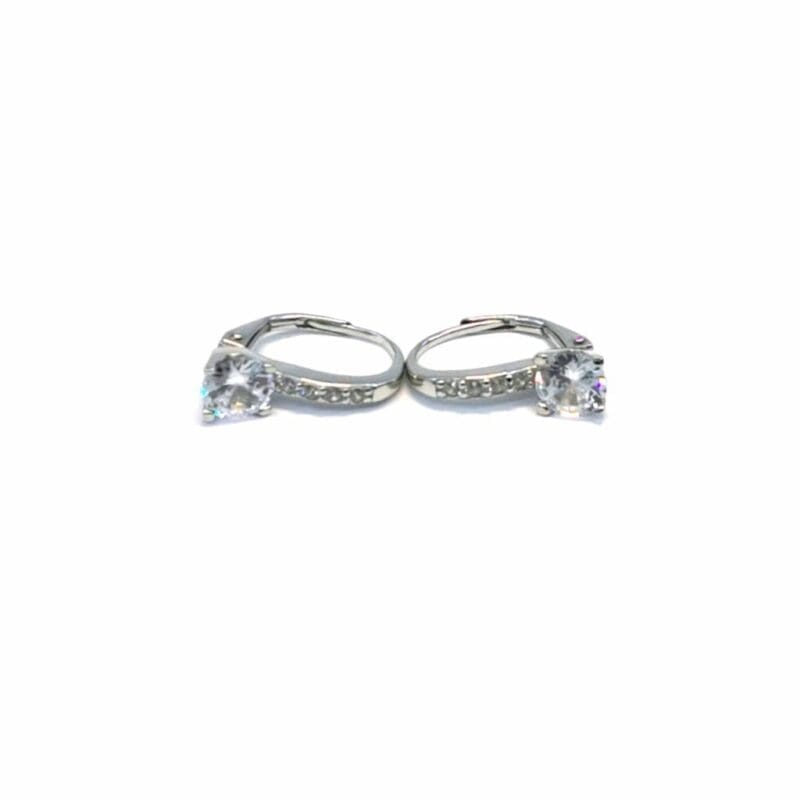 White four-claw stone leverback earrings in hallmarked, rhodium-plated 925 sterling silver – front and side views – DRESCHER Jewellery®