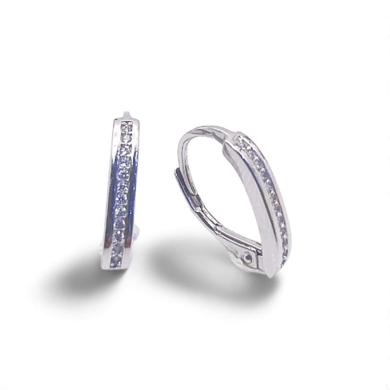 Single-row white stone patent-clasp earrings in hallmarked, rhodium-plated 925 sterling silver – front view – DRESCHER Jewellery®
