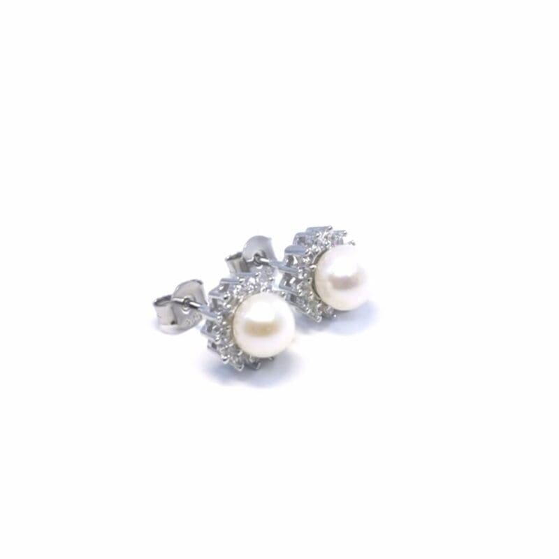 Pearl stud earrings with white stone halos, crafted with hallmarked, rhodium-plated 925 sterling silver – alternate side view – DRESCHER Jewellery®