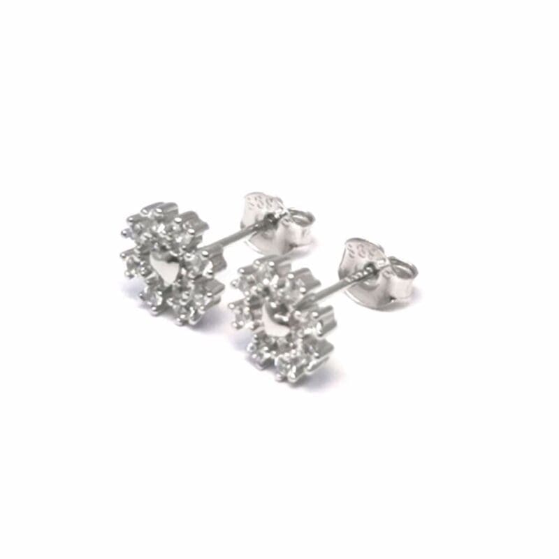 White stone snowflake stud earrings in hallmarked, rhodium-plated 925 sterling silver – angled view – DRESCHER Jewellery®