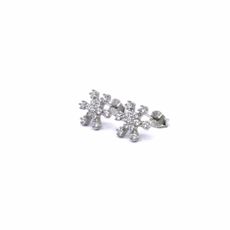 White stone snowflake stud earrings in hallmarked, rhodium-plated 925 sterling silver – angled view – DRESCHER Jewellery®