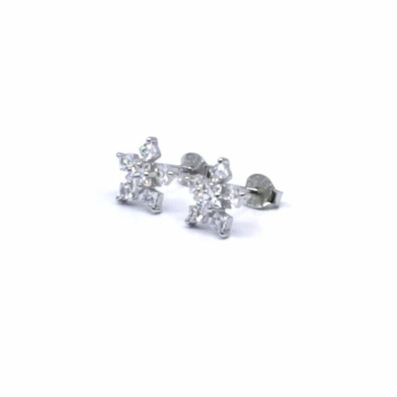 White stone geometric snowflake stud earrings in hallmarked, rhodium-plated 925 sterling silver – angled view – DRESCHER Jewellery®