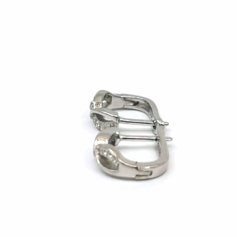 Wavy white stone small hoop earrings in hallmarked, rhodium-plated 925 sterling silver – side view – DRESCHER Jewellery®