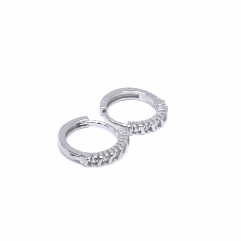 White stone small hoop earrings in hallmarked, rhodium-plated 925 sterling silver – side view – DRESCHER Jewellery®