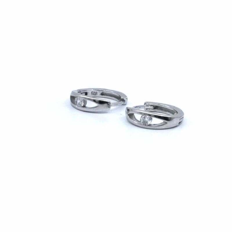 White stone small hoop earrings in hallmarked, rhodium-plated 925 sterling silver – angled view – DRESCHER Jewellery®