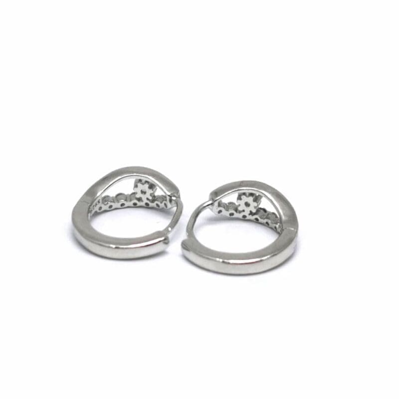 White stone flower-motif small hoop earrings in hallmarked, rhodium-plated 925 sterling silver – side view – DRESCHER Jewellery®