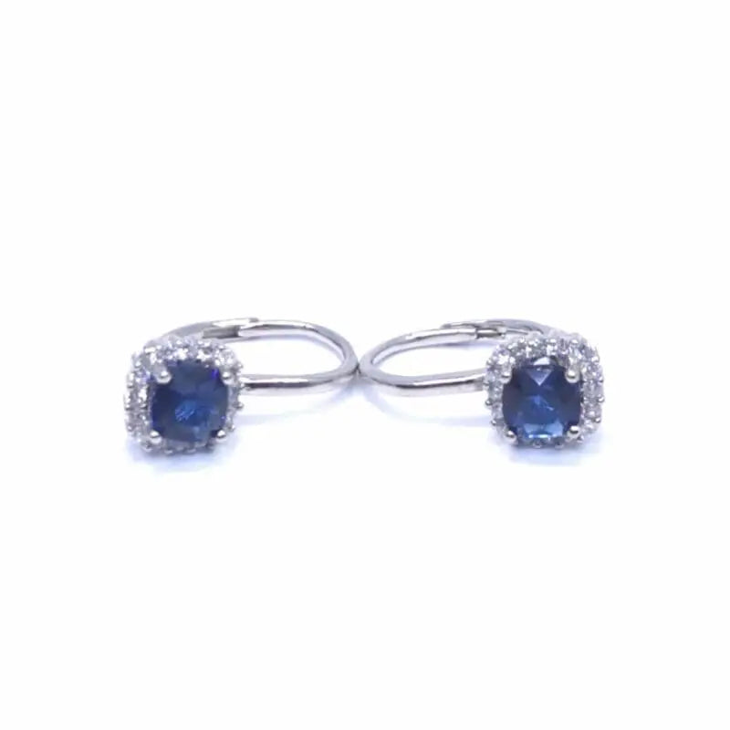 Dark blue four-claw stone leverback earrings in hallmarked, rhodium-plated 925 sterling silver – front and side views – DRESCHER Jewellery®