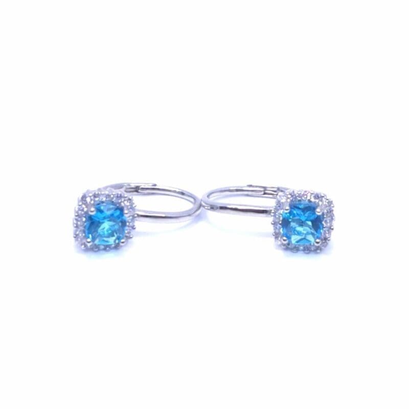 Light blue four-claw stone leverback earrings in hallmarked, rhodium-plated 925 sterling silver – front and side views – DRESCHER Jewellery®