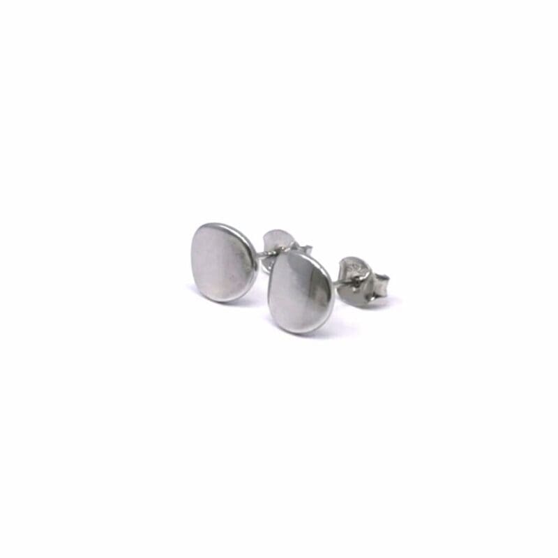 Polished round disc stud earrings in hallmarked, rhodium-plated 925 sterling silver – angled view – DRESCHER Jewellery®