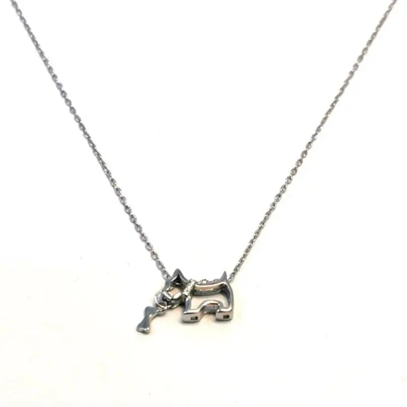 necklace with white stone dog pendant - playful bone in mouth in hallmarked, rhodium-plated 925 sterling silver – front view – DRESCHER Jewellery®