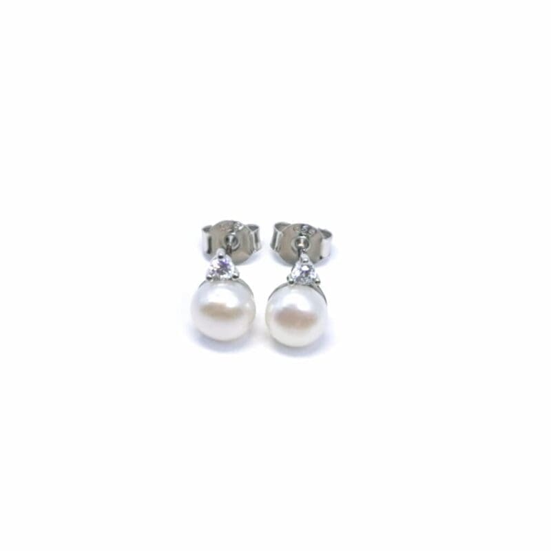 White stone pearl silver stud earrings, with silver components crafted from hallmarked, rhodium-plated 925 sterling silver – alternate front view – DRESCHER Jewellery®