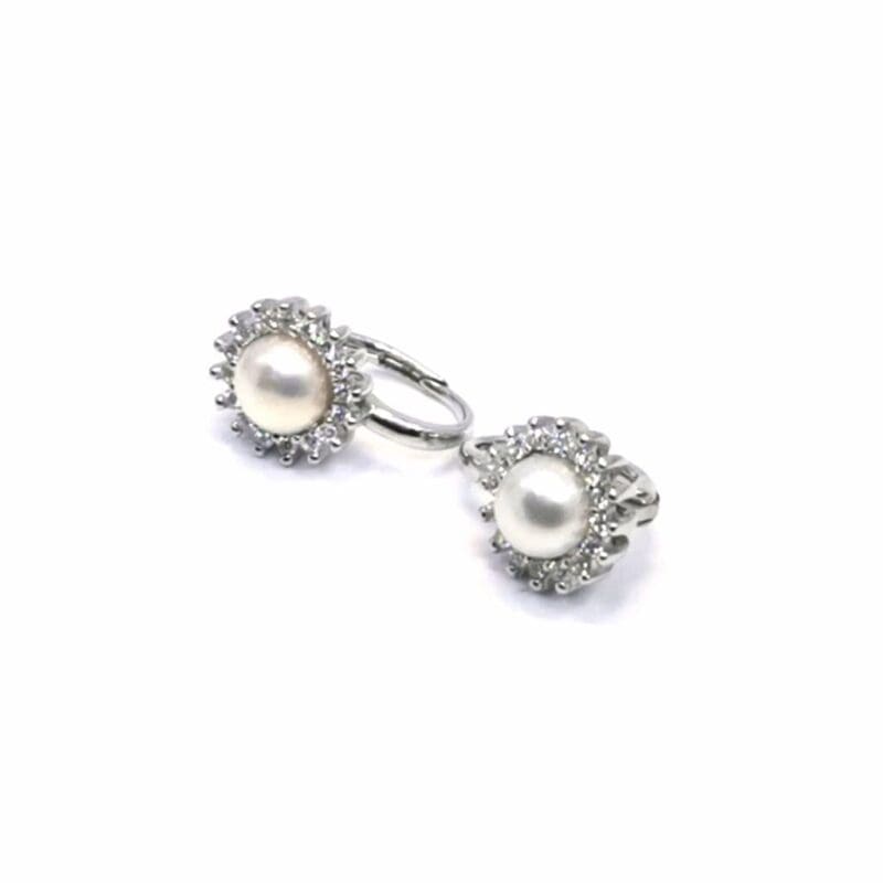 Pearl drop earrings with stone-set leverback closures, crafted with hallmarked, rhodium-plated 925 sterling silver – alternate angled view – DRESCHER Jewellery®