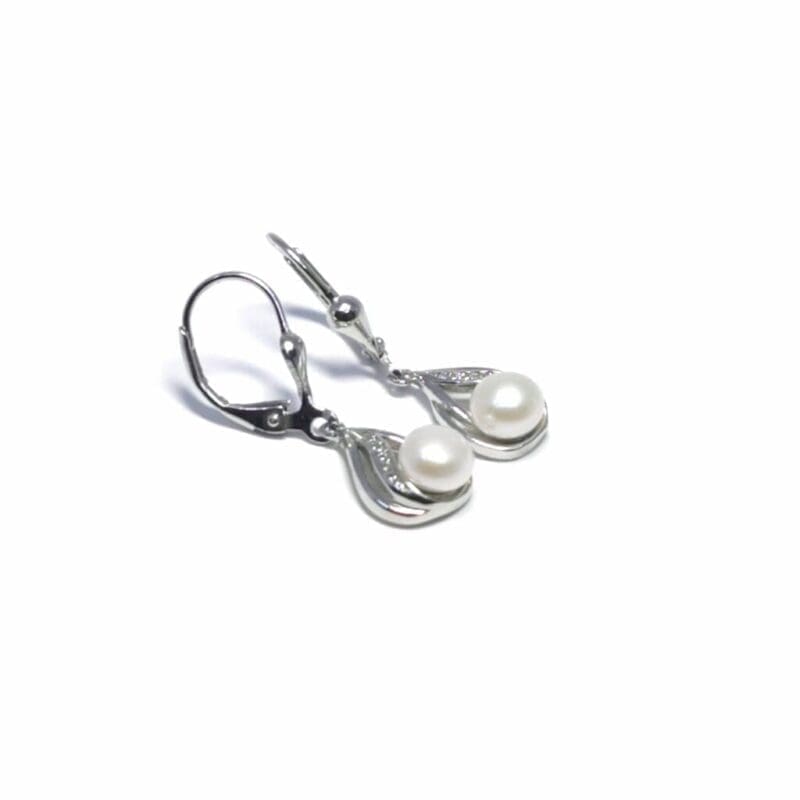 Patent closure white stone pearl hanging earrings, with silver components crafted from hallmarked, rhodium-plated 925 sterling silver – alternate side view – DRESCHER Jewellery®
